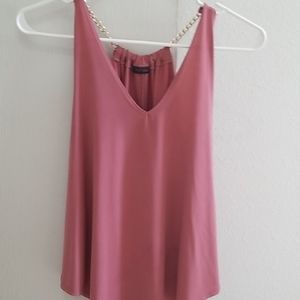 Pink flowy tank top with golden chain
